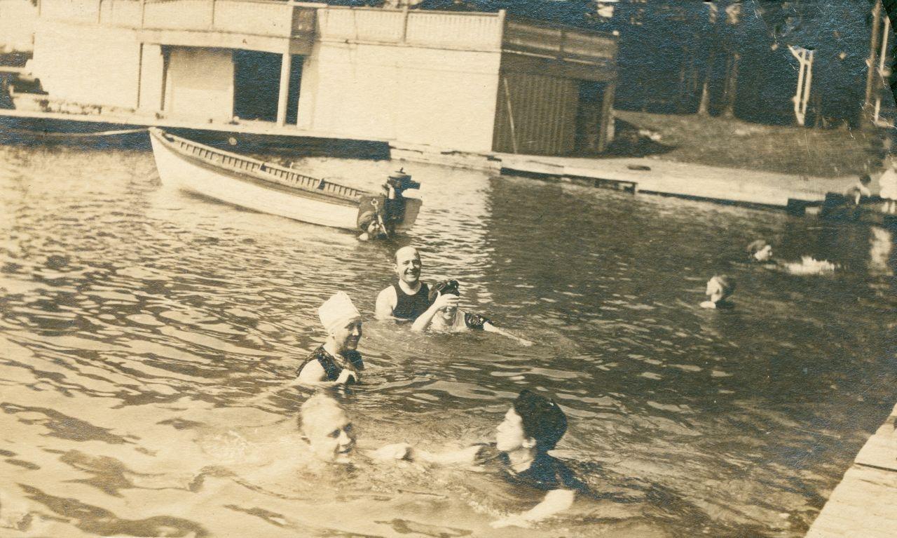 Middle Bass Club: Members swimming at the Middle Bass Club dock.