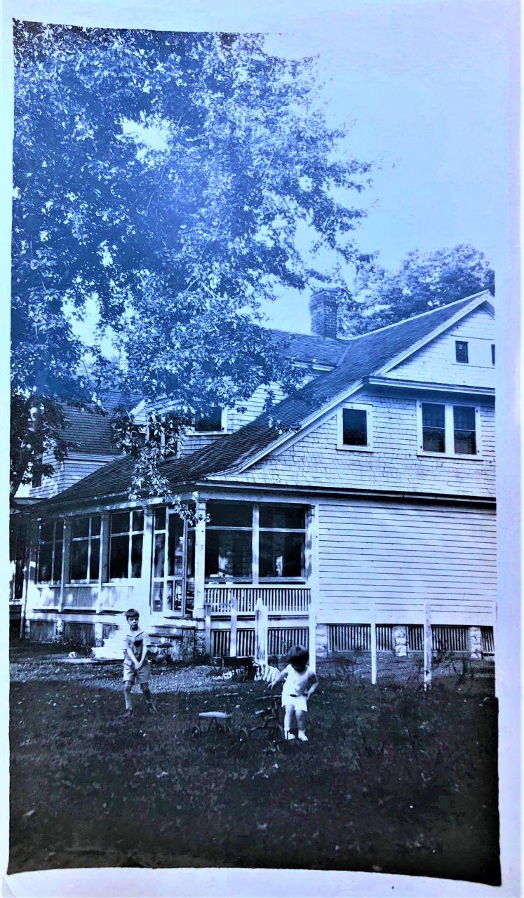Brothers Isaac Kinsey III (Pete) and Bigelow (Big) outside the family's cottage on Grape Avenue at the Middle Bass Club. Circa 1925. Source: Maggie Kinsey Wood