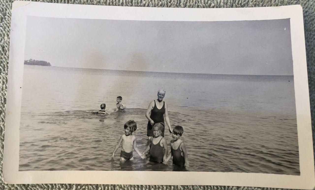Brothers Isaac Kinsey III (Pete) and Bigelow (Big) at "Sandy Beach" on the east side of Middle Bass Island.  Circa 1927.  Source: Maggie Kinsey Wood