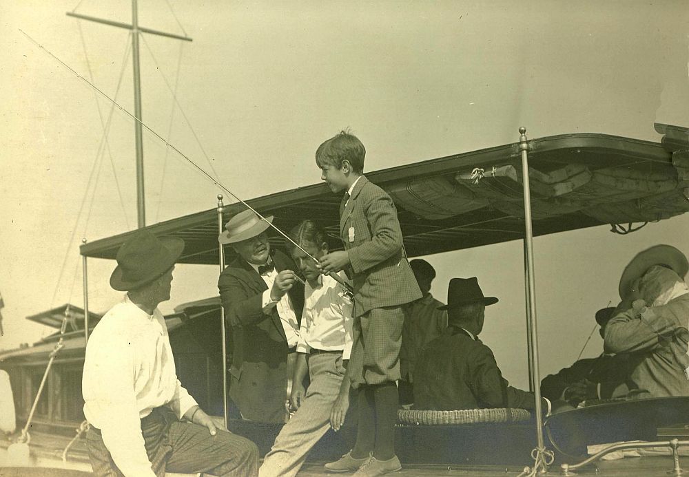 Charlie Taft leaving the Faustina and getting into a rowboat