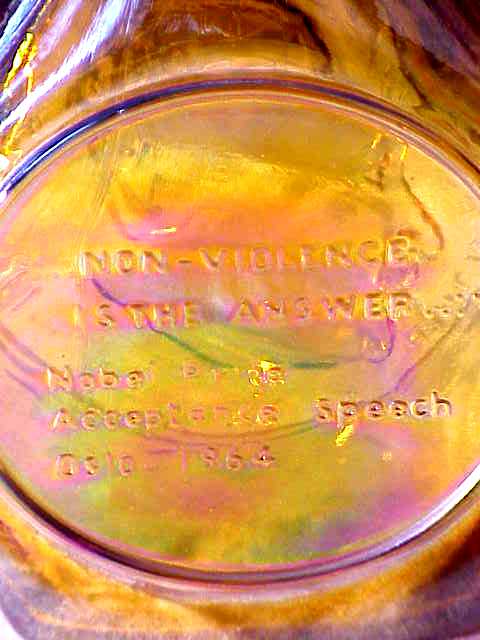 Dr. Martin Luther King Flask, closeup view of text on the other side (Wheaton Glass Co., Millville, NJ, circa 1960's)