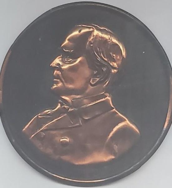 Copper face plate of President McKinley after his assassination in 1901.