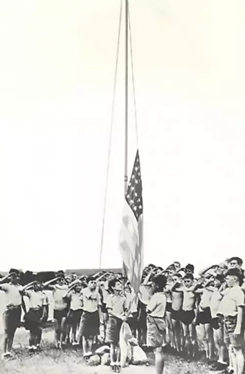 Saluting the American flag