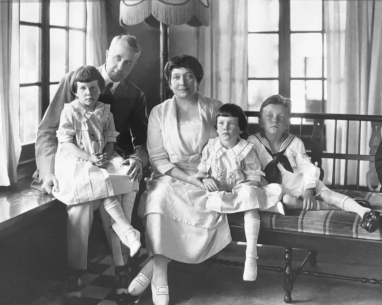 Family portrait: William K Terry Sr., Helen Wright Suydam Terry, Margaret Terry (left), Mary Ann Terry (right) and William K. Terry Jr.  Circa 1920.  The family owned a cottage on Grove Avenue.  William K Terry took a video at the Middle Bass Club in 1933 which is included on this website.  Helen's brother Horace Wright Suydam took a video at the Middle Bass Club in 1928 which is included on this website.  Source: Carroll Terry