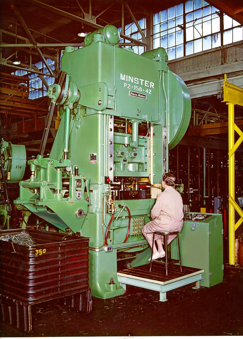 Woman operating Minster Press, 1970s