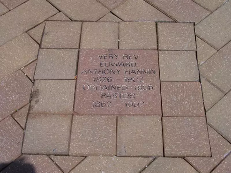 A brick in the Memorial Garden with Father Hannin's name inscribed